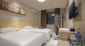 Μια τηλεόραση ή/και κέντρο ψυχαγωγίας στο Jinjiang Inn Wenzhou Shuangyu The Terminal