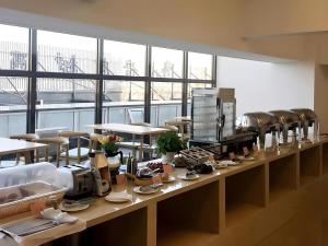 a counter in a room with aasteryasteryasteryasteryasteryasteryasteryasteryastery at Vatica Beijing Tongzhou Liyuan Universal Studios in Liyuanzhen