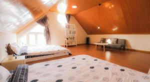 Ένα ή περισσότερα κρεβάτια σε δωμάτιο στο Dalat CASA