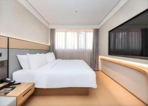 Μια τηλεόραση ή/και κέντρο ψυχαγωγίας στο JI Hotel Shanghai Xietu East Road