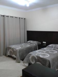 Hotel de la Mediterranee客房内的一张或多张床位