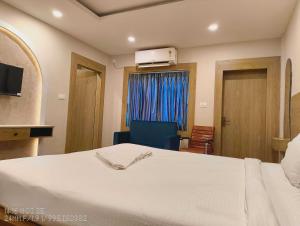 Postel nebo postele na pokoji v ubytování Collection O Bhubaneswar Industrial Estate Formerly Hotel Vrinda