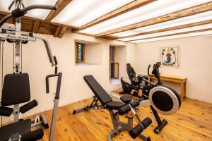 a gym with several exercise bikes in a room at Gulevi Safranbolu Heritage Hotel in Safranbolu