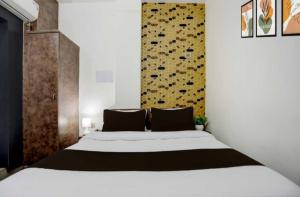 Voodi või voodid majutusasutuse Hotel O Railway Station Nathnagar Formerly Peepal Tree toas +13 fotot