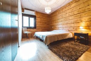 Postel nebo postele na pokoji v ubytování Rannatamme Villa