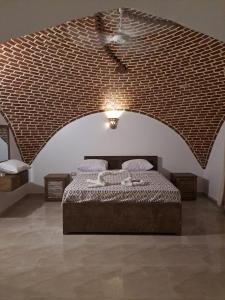 Postel nebo postele na pokoji v ubytování Beit Al Madina