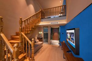 Μια τηλεόραση ή/και κέντρο ψυχαγωγίας στο Orange Hotel, Beijing Daxing Biomedicine Base