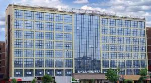 a large building with lots of windows at Lavande Hotel Shenzhen Pingshan High-Speed Railway Station Longdong Metro Station in Longgang