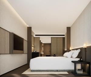 Schlafzimmer mit einem weißen Bett und einem Flachbild-TV in der Unterkunft K SPACE Hotel - Guangzhou Beijing Road Pedestrian Street Dafo Ancient Temple Branch in Guangzhou + 5 Fotos