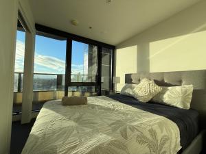 Postel nebo postele na pokoji v ubytování Prime location in Southbank - Wrap + 62 fotografií