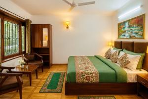 Ένα ή περισσότερα κρεβάτια σε δωμάτιο στο The Ambience Resort, Nainital - A Hidden Gem Away From City Hustle