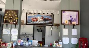 a wall with a clock and a picture of horses on it at Sixty-nine Resort in Ban Tha Khwai +121 photos