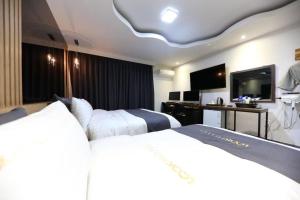 Kuchyň nebo kuchyňský kout v ubytování Hotel Look