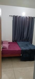 Ένα ή περισσότερα κρεβάτια σε δωμάτιο στο Green palace service villa