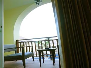 Posezení v ubytování Khamthana the Colonial Hotel Chiangrai