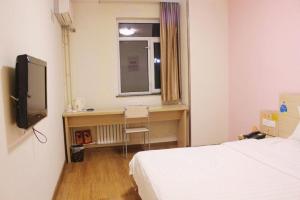 Φωτογραφία από το άλμπουμ του 7 Days Inn Weihai High-Speed Railway & Bus Station σε Weihai +236 φωτογραφίες