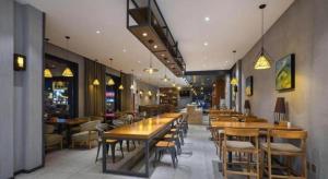 Restaurace v ubytování Qiuguo Hotel Beijing BIEC & Airport