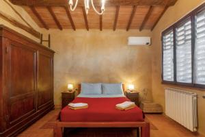 Postel nebo postele na pokoji v ubytování Borghetto Flat con piscina + 35 fotografií