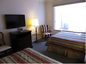 Postel nebo postele na pokoji v ubytování Hilgard House Westwood Village