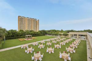 an overhead view of a lawn with tables and chairs at DoubleTree by Hilton Agra in Agra