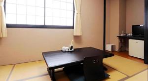 Kuchyň nebo kuchyňský kout v ubytování Hotel The Grand Court Matsusaka