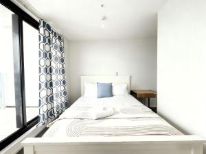 Ένα ή περισσότερα κρεβάτια σε δωμάτιο στο Stylish High-Rise Studio with City Views AKL CBD +20 φωτογραφίες