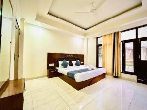 Postel nebo postele na pokoji v ubytování Rose Garden