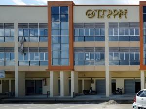 an office building with a sign on it at TT Dorf Hotel (Taiping) in Taiping