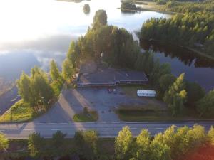 an aerial view of a house on an island in a lake at Lomasaaret in Villala