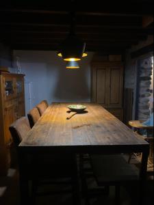 a dining room table with a bowl on top of it at Chalet coeur d'alpage La Plagne Les Arcs in La Plagne Tarentaise