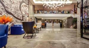 Posezení v ubytování Echarm Hotel Guizhou Xingyi Jushan Avenue