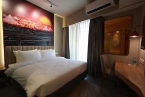 Postel nebo postele na pokoji v ubytování Remedra Hotels and Residences