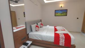 Ένα ή περισσότερα κρεβάτια σε δωμάτιο στο Hotel Nishara +49 φωτογραφίες