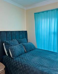 Postel nebo postele na pokoji v ubytování Vasco Geusthouse