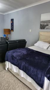 Postel nebo postele na pokoji v ubytování Vasco Geusthouse