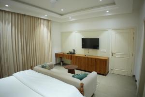 Μια τηλεόραση ή/και κέντρο ψυχαγωγίας στο Kaayanaat Villa