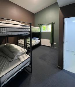 En eller flere senge i et værelse på South Downs Hostel Eastbourne