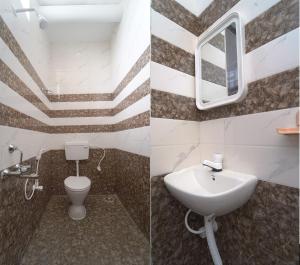 Ένα μπάνιο στο The vivekam Homestay nr Hindustan college Nava india