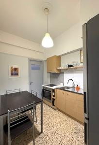 Η κουζίνα ή μικρή κουζίνα στο Patras City Stay 4