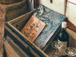 a box with a book and a bottle of wine at LATERAL - Vacation STAY 36610v in Shiojiri