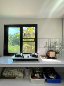 Köök või kööginurk majutusasutuses TT Haus Chiangdao