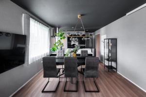 TV a/nebo společenská místnost v ubytování The Obsidian