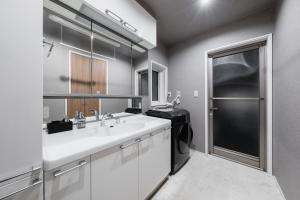 Kuchyň nebo kuchyňský kout v ubytování The Obsidian