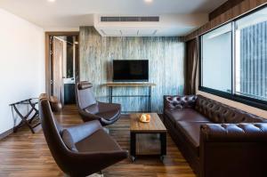 TV a/nebo společenská místnost v ubytování Acqua Hotel + 120 fotografií