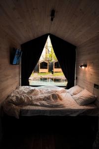 Voodi või voodid majutusasutuse SmartVille Kyiv toas