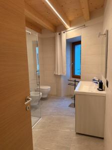 Koupelna v ubytování Appartamento Ambro