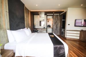 Postel nebo postele na pokoji v ubytování Acqua Hotel