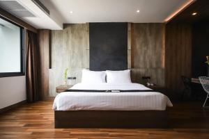 Postel nebo postele na pokoji v ubytování Acqua Hotel