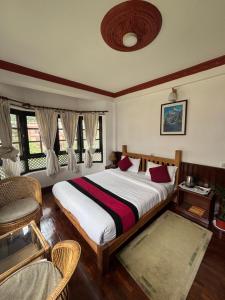 Postel nebo postele na pokoji v ubytování Eco Home Kathmandu