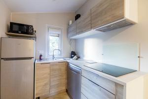 Køkken eller tekøkken på Mobil home 408 tout confort